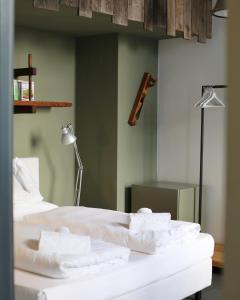 grätzlhotel beim Belvedere客房内的一张或多张床位