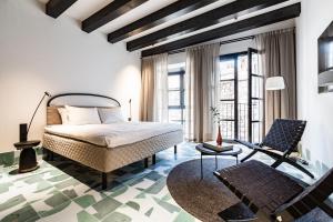 Posteľ alebo postele v izbe v ubytovaní Concepcio by Nobis, Palma, a Member of Design Hotels