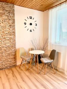 Posezení v ubytování Apartment Tatry - spacious 3BD, Netflix & fast internet