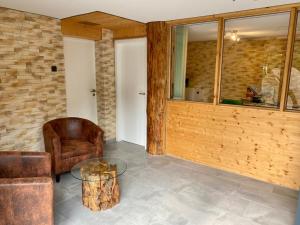 Posezení v ubytování Naturstammhaus und Appartements Zum Brockenbaecker