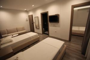 Postel nebo postele na pokoji v ubytování Hotel Mare 2