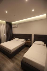 Postel nebo postele na pokoji v ubytování Hotel Mare 2