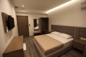 Postel nebo postele na pokoji v ubytování Hotel Mare 2