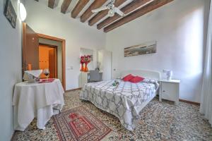 En eller flere senger på et rom på Residenza Briati