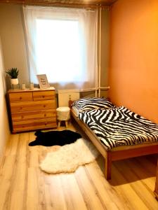 מיטה או מיטות בחדר ב-Apartment Tatry