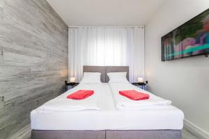 Postel nebo postele na pokoji v ubytování Dobre smaki at Wczasowa8 sea resort