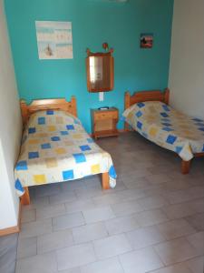 Posteľ alebo postele v izbe v ubytovaní Asimina's House