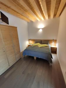 Postel nebo postele na pokoji v ubytování Bio Agritur al Bait