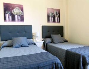 Posteľ alebo postele v izbe v ubytovaní Villa de lujo en Sancti Petri + 19 fotografií