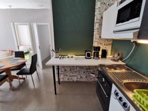 Kuchyň nebo kuchyňský kout v ubytování Stunning 2-Bed Apartment in Kotka Sauna Facility
