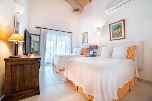 Postel nebo postele na pokoji v ubytování Luxurious 5-bedroom Villa Oasis in Casa de Campo