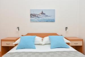 Posteľ alebo postele v izbe v ubytovaní Apartman Moga Dida
