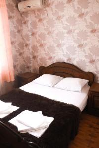 
Кровать или кровати в номере Черномор Отель
