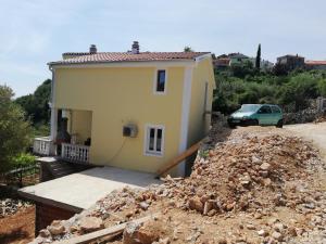 a house under construction with a pile of rubble at Villa Frane 101 in Beli