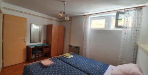 Posteľ alebo postele v izbe v ubytovaní Apartments Jurić - 4 An apartment for 3 in the center