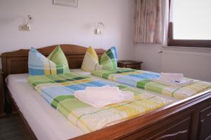 Postel nebo postele na pokoji v ubytování Hotel Waldschlösschen