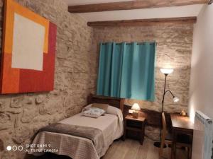A bed or beds in a room at CASA SARTZALETA-Navarra-España Még 19 kép