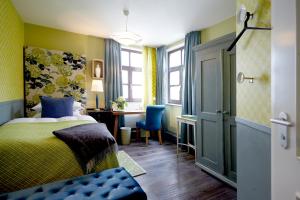Postel nebo postele na pokoji v ubytování Fährhaus Meißen B&B