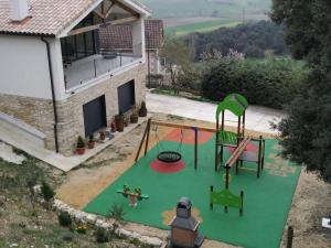 O vedere a piscinei de la sau din apropiere de CASA SARTZALETA-Navarra-España