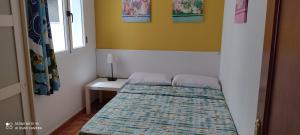Postel nebo postele na pokoji v ubytování Apartamento "CASA LOS SABANDEÑOS"