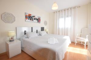 A bed or beds in a room at Casa Liss