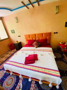 Rúm í herbergi á Riad Atlas Garden