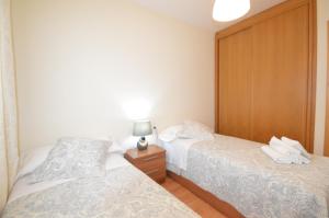 A bed or beds in a room at Casa Liss