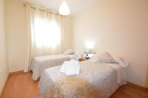 A bed or beds in a room at Casa Liss