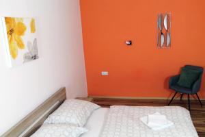 Posteľ alebo postele v izbe v ubytovaní Guest House Vila Pod Lesom