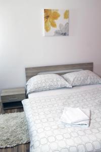 Posteľ alebo postele v izbe v ubytovaní Guest House Vila Pod Lesom