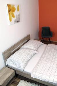 Posteľ alebo postele v izbe v ubytovaní Guest House Vila Pod Lesom