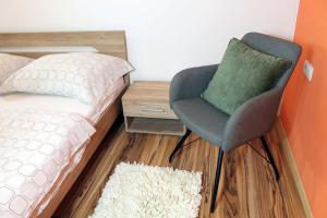 Posteľ alebo postele v izbe v ubytovaní Guest House Vila Pod Lesom