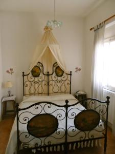 מיטה או מיטות בחדר ב-Cà di Twergi