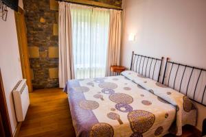 Postel nebo postele na pokoji v ubytování Hotel Palacio Atxega