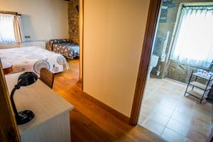 Postel nebo postele na pokoji v ubytování Hotel Palacio Atxega