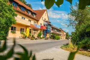 an empty street in a town with buildings at Landgasthof Schwarz in Windsbach