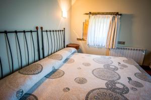 Postel nebo postele na pokoji v ubytování Hotel Palacio Atxega