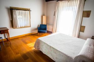 Postel nebo postele na pokoji v ubytování Hotel Palacio Atxega