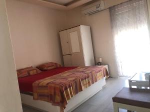 Postel nebo postele na pokoji v ubytování Guesthouse Adriatic