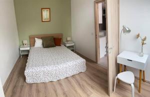 Posteľ alebo postele v izbe v ubytovaní BIBI Terasz Apartman