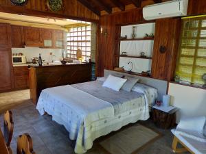 A kitchen or kitchenette at Monolocali In Casa Con Giardino Bellagio