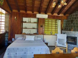 A bed or beds in a room at Monolocali In Casa Con Giardino Bellagio