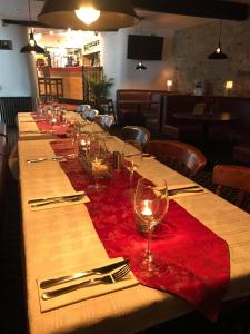 a dining room table set for a party at The Portcullis Hotel in Bristol