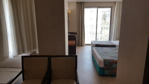 Postel nebo postele na pokoji v ubytování Sultan Sipahi Resort Hotel