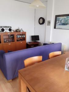 A television and/or entertainment centre at Cantos do Coido