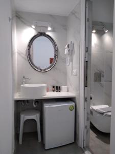 Koupelna v ubytování Asteri Hotel + 37 fotografií