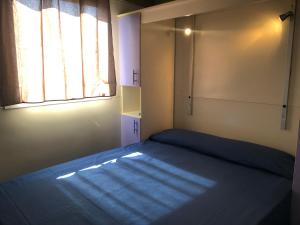 En eller flere senger på et rom på Mediterrani Natura Spa Resort