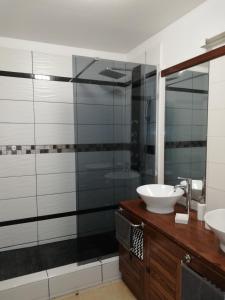Ett badrum på Appartement Meublé de Tourisme