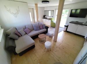 an overhead view of a living room with a couch at Prangli Valgekivi in Kelnase