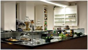 a kitchen with a counter with food on it at Il Caminetto Montefiascone in Montefiascone